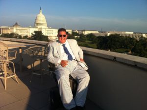 Photo of Mark Odum on the roof of the Department of Labor building